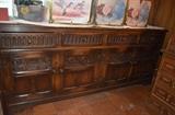 Gorgeous antique carved relief buffet, 8' long