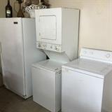 Deep freeze, stacking washer dryer, washer. There is also another washer  and dryer.