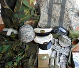 Military Items including a small child's pants, shirt, cap and boots