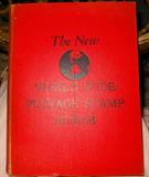 1952 Stamp Collecting Book holding many stamps from all over the world-Title: The New World Wide Postage Stamp Album