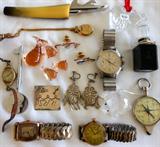 Wittnauer Chronograph Watch, Benrus Watch, Swarovski Turtle, Antique Perfume Bottle, Handmade Boda Sweden Bird, Compass, Mexican Sterling Brooch, Glass Miniature Whales, Vintage Locket and more