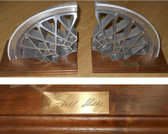 Engraved Carroll Shelby Wheel Rim Bookends presented to the client by Carroll Shelby himself