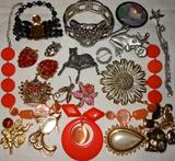 Harrice Simons Miller Jelly Belly Fish Brooch, Kenneth Jay Lane Strawberry Pins, Large Leopard Head Stretch Bracelet, Retro Orange Plastic Necklace, Tarantula Stretch Bracelet, Kenneth Jay Lane Crown Brooch, Vintage Sarah Coventry, Sterling pieces and more