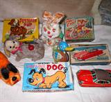 Working Vintage Pestered Pup Toy; Tail Spins, Ladybug runs up and down his back and his head turns. Wind up Sniffing Dog Toy, Western Germany Magic Tin Car with Original Box, Scary Looking Wind up Rabbit with Carrot, Wind up Duck and more