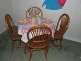 Childs oak table with Little Tike tea set.