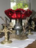 Ruby glass and brass centerpiece.