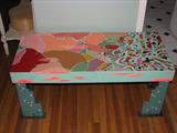 Artist signed abstract wood bench.