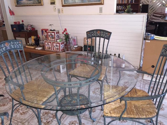 Heavy cast iron table base & 4 chairs w/rush seats & hand painted design