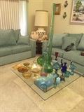 Green sofa and love, colored glassware