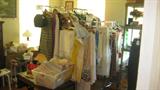Vintage Table linens, handkerchiefs, clothing. WWII Uniforms and Candlelight Satin wedding dress are (consignment items) Candles, Queen Maple Headboard/foot Bed, dresser, bedside table, and writing desk. Dark wood, harp design swing arm extension coffee table, Rich wood Mirrored Sofa Table. Dark finish Pine narrow 5-drawer chest of drawers.
