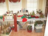 CHRISTMAS IN JULY!!! SO many one of a kind decor`, trims , ornaments and 7.5 ft Christmas tree and 3 pine trees. Many wrappings, ribbons, floral & music carousels! Department 56 Christmas Village & HALLMARK tin ornament village collection.