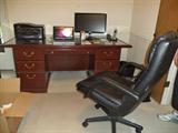 Nice Cherry wood Desk with two file drawers and office black leather chair