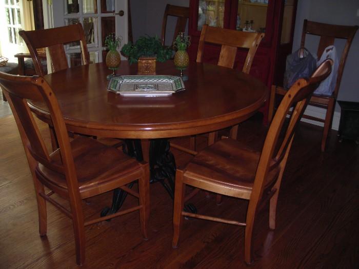 Beautiful table with a leaf and 6 chairs by Nichols & Stone