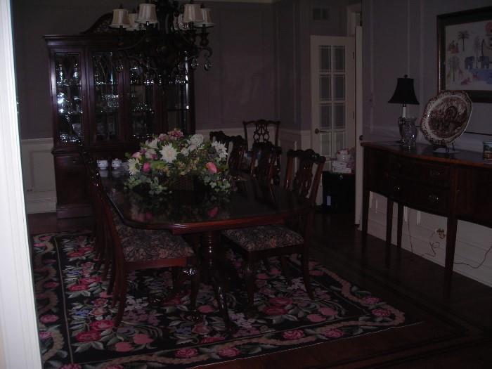 Ethan Allen table with ten chairs, China cabinet and server.  Also stunning server and nice rug