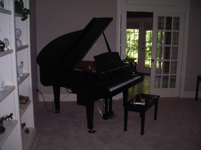 This piano will be at the sale!  Baby grand player piano