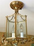 Glass and brass light fixture