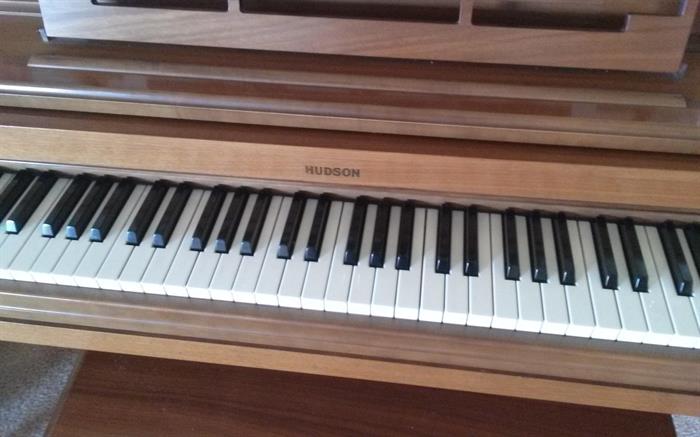 Hudson upright piano with bench