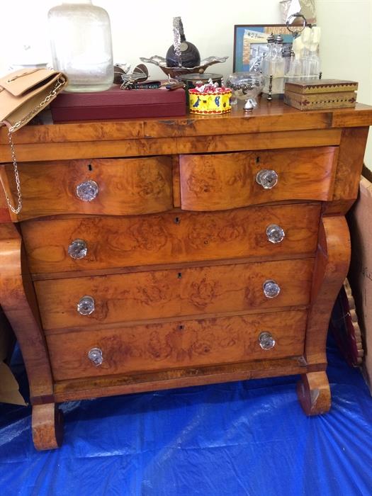 Empire chest with huge glass knobs, exquisite wood.