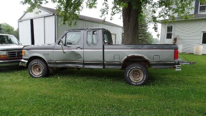 1989 Ford F-150 truck..extended cab...4 x 4..automatic V8..runs, drives...needs a new windshield..new tires and rims.