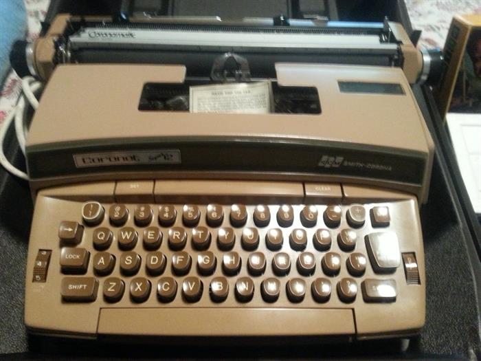 Vintage electric typewriter with case