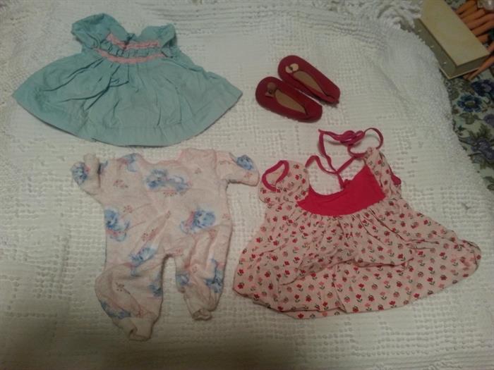 Bags of baby doll clothes