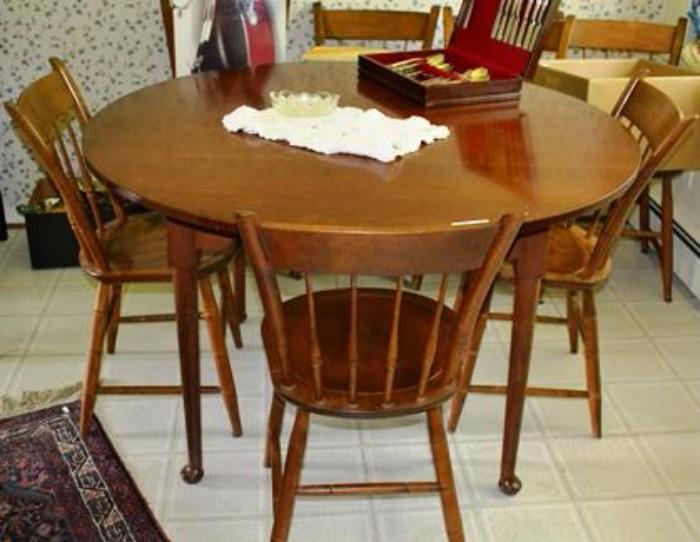 Suters Q.A. table shown with 6 Nichols and Stone maple windsor chairs