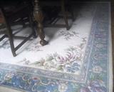 Wonderful Area Rug Presented in a Dining Room.