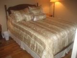 Full Size Bed Headboard, Footboard and Bedding. The mattress, boxspring and frame are not for sale.