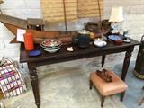 Conference table , chinese junk , copper pots, antique latin american textiles