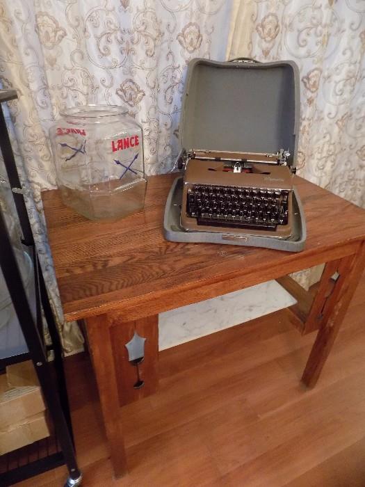 vintage typewriter, Lance jar, and antique table