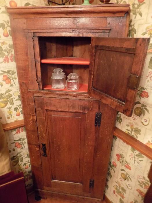 antique corner cabinet from late 1800's