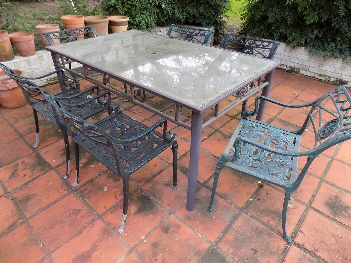 wrought iron patio table with 6 chairs