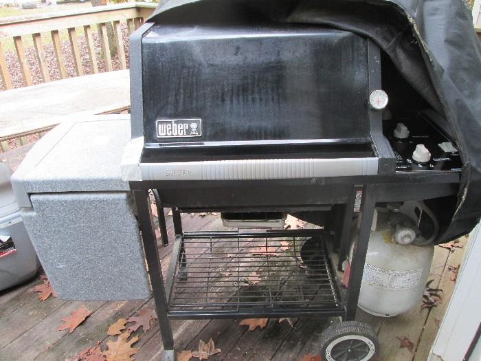 Weber gas Grill with propane tank (Used only twice)