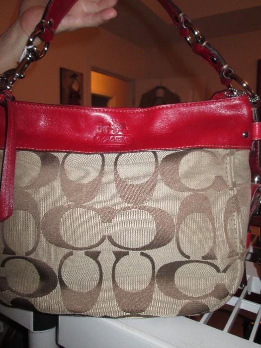 Coach Signature with red leather trim