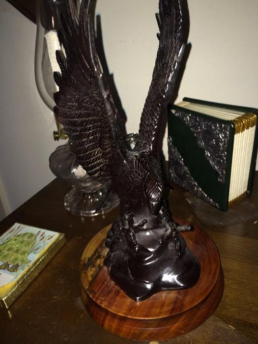     Eagle statue on wooden mount