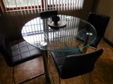 Ashley Home Place. Round Glass Thick Table Top. Chrome Legs. 4 Black Vinyl Chrome Frame Side Chairs
