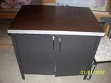 Metal table with storage