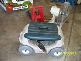Gardening cart with seat.
