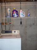 Overhead rack to hold laundry supplies