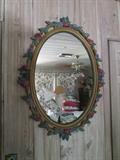 rose-adorned vintage mirror