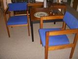 Pair of chairs, one with tag that reads: Color = K 186 Knoll Blue. 