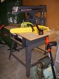 Craftsman radial arm saw in garage