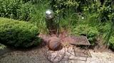 Great metal chair and garden art