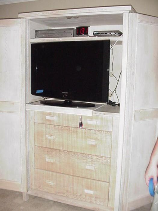 Armoire with drawers for storage,  flat screen television