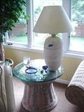 Rattan table, lamp, serving pieces