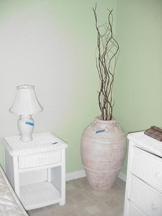 Wicker side table and decorative jar