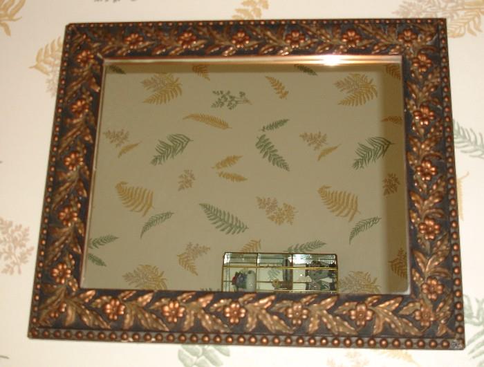 Mirror with decorative frame