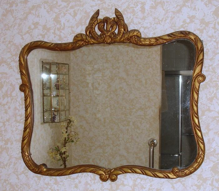 Vintage mirror with decorative frame