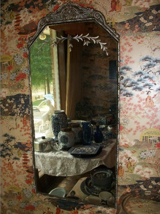 several antique mirrors are for sale