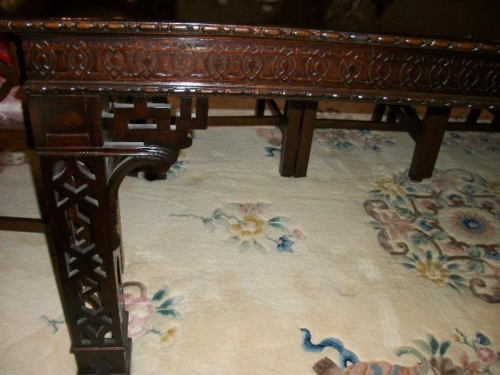 legs and intricate carving of this fine table